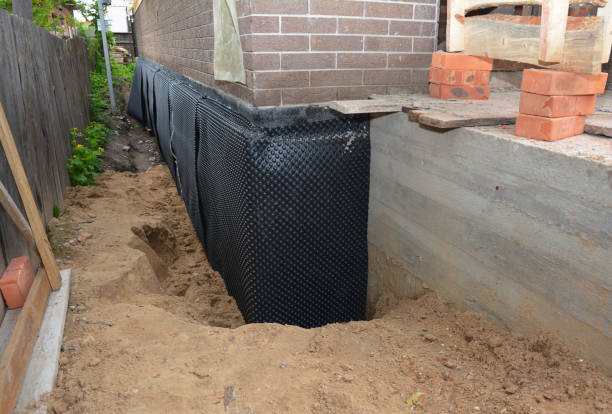 Happy homeowners after waterproofing job in Niagara Falls